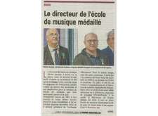 Le directeur de l'école de musique médaillé