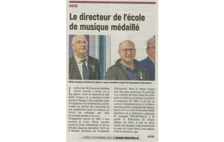 Le directeur de l'école de musique médaillé